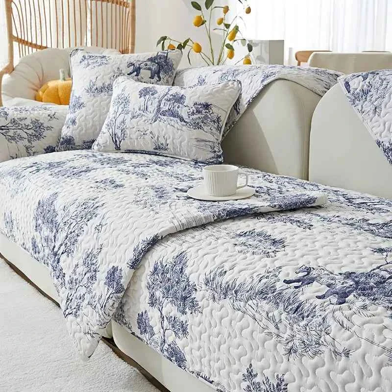 Universal Sofa Cover – Stretch Fabric Furniture Protector on an elegant sofa with floral designs.