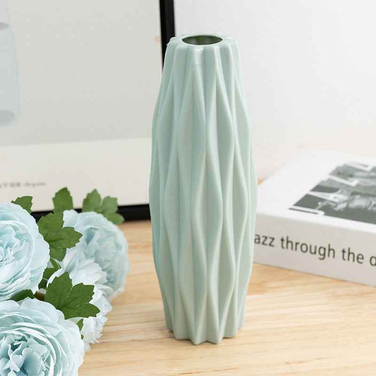 Nordic Durable Plastic Flower Vase – Modern Home Accent | Elden Home in light blue with modern design and minimalist shape.
