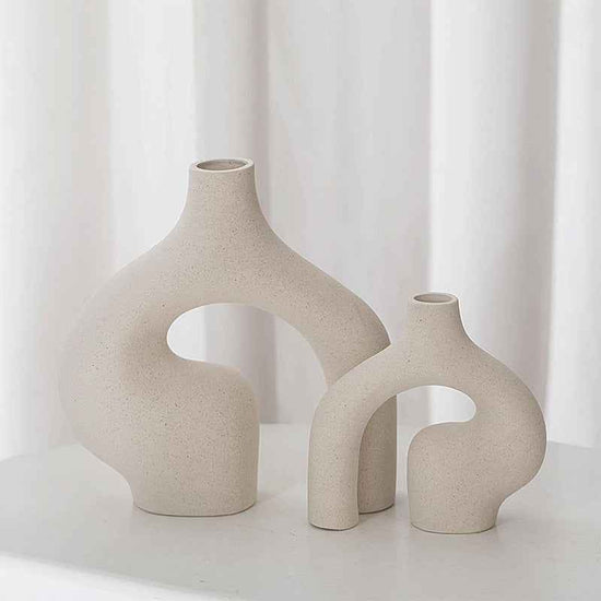 Nordic ceramic vases in minimalist design, perfect for floral home decor, showcasing modern aesthetics and clean lines.