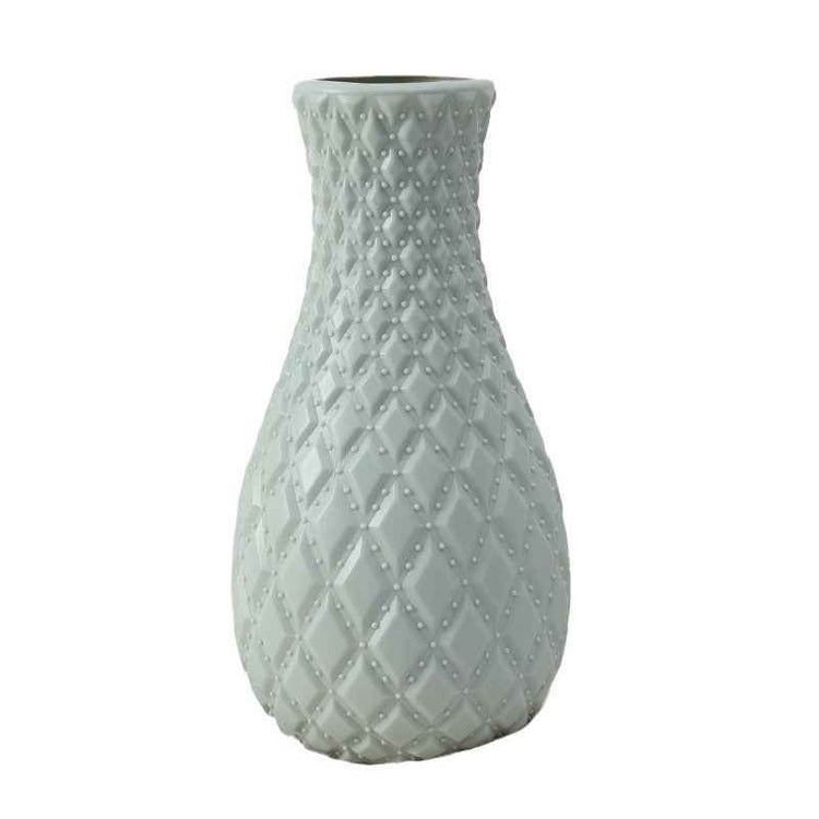 Durable plastic flower vase with a textured diamond pattern, perfect for modern home decor.