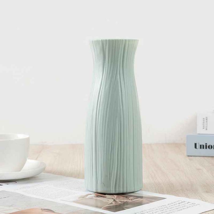 Nordic Durable Plastic Flower Vase – Modern Home Accent | Elden Home displayed on a table, featuring a sleek design.
