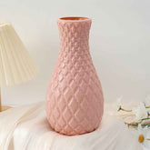 Nordic Durable Plastic Flower Vase – Modern Home Accent | Elden Home in pink with textured design on a table.