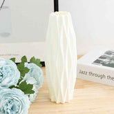 Nordic Durable Plastic Flower Vase – Modern Home Accent | Elden Home on a wooden table with flowers.