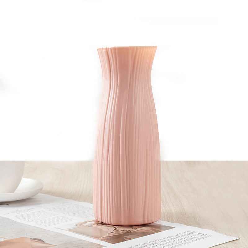 Nordic Durable Plastic Flower Vase – Modern Home Accent | Elden Home in pink color on a table.