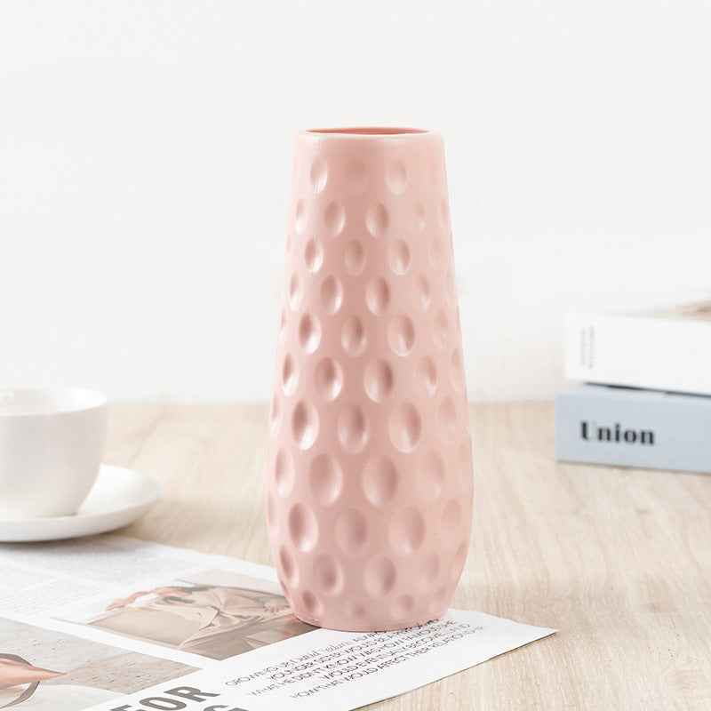 Nordic Durable Plastic Flower Vase – Modern Home Accent | Elden Home on a wooden table with magazines and a cup.