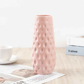 Nordic Durable Plastic Flower Vase – Modern Home Accent | Elden Home on a wooden table with magazines and a cup.