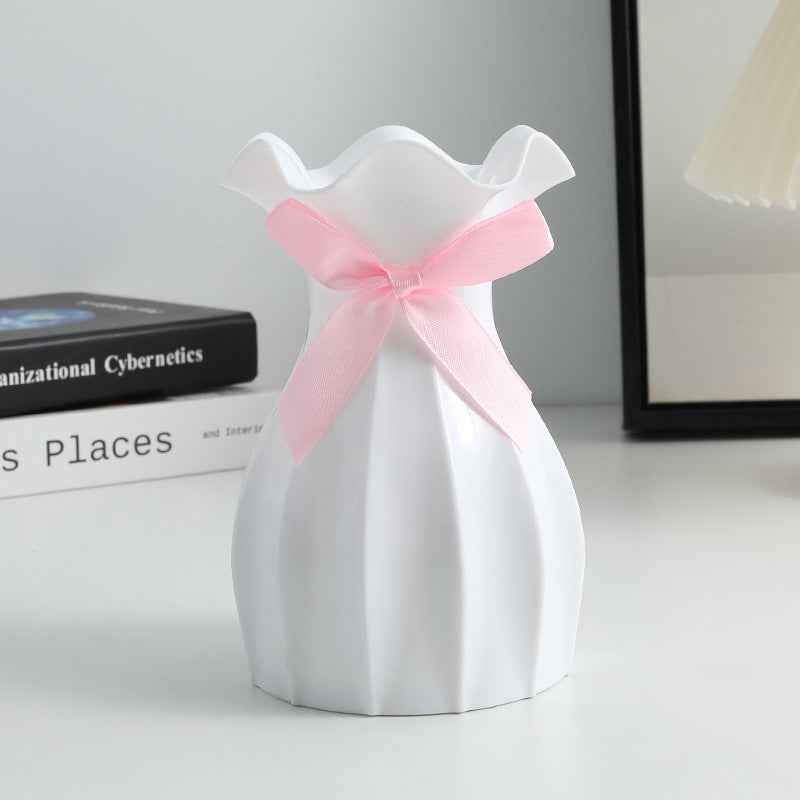 Nordic Durable Plastic Flower Vase – Modern Home Accent | Elden Home with pink ribbon on a white background.