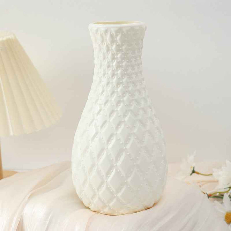 Nordic durable plastic flower vase in sleek white design, perfect for modern home decor accents.