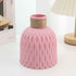 Nordic durable plastic flower vase in pink with textured design, perfect for modern home decor.