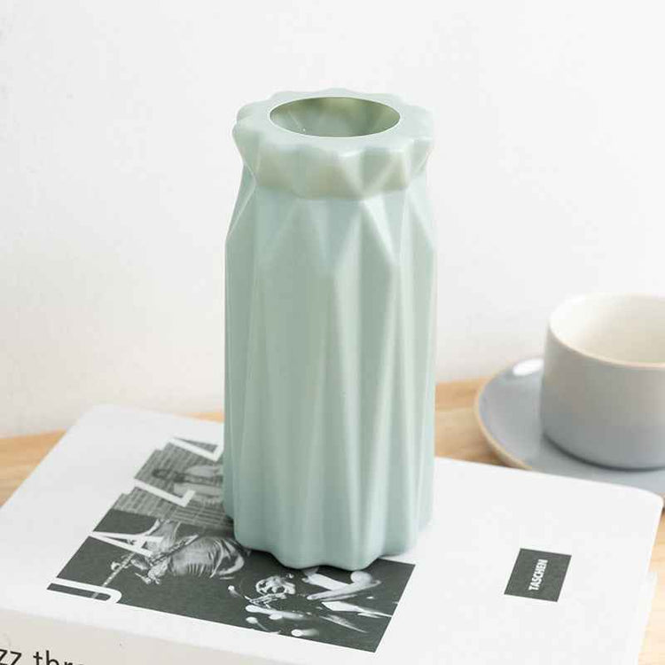 Nordic Durable Plastic Flower Vase – Modern Home Accent | Elden Home in soft blue color on a table.