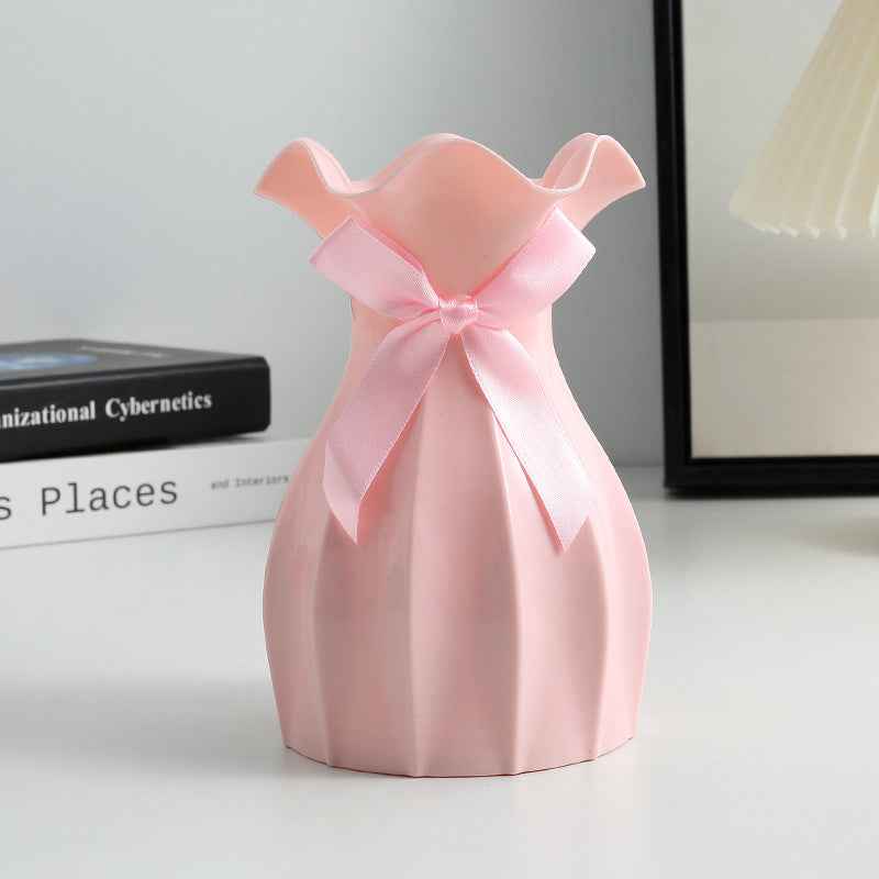 Nordic Durable Plastic Flower Vase – Modern Home Accent | Elden Home in pink with a bow, designed for modern decor.