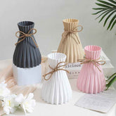 Nordic Durable Plastic Flower Vase – Modern Home Accent | Elden Home in various colors and styles arranged elegantly.
